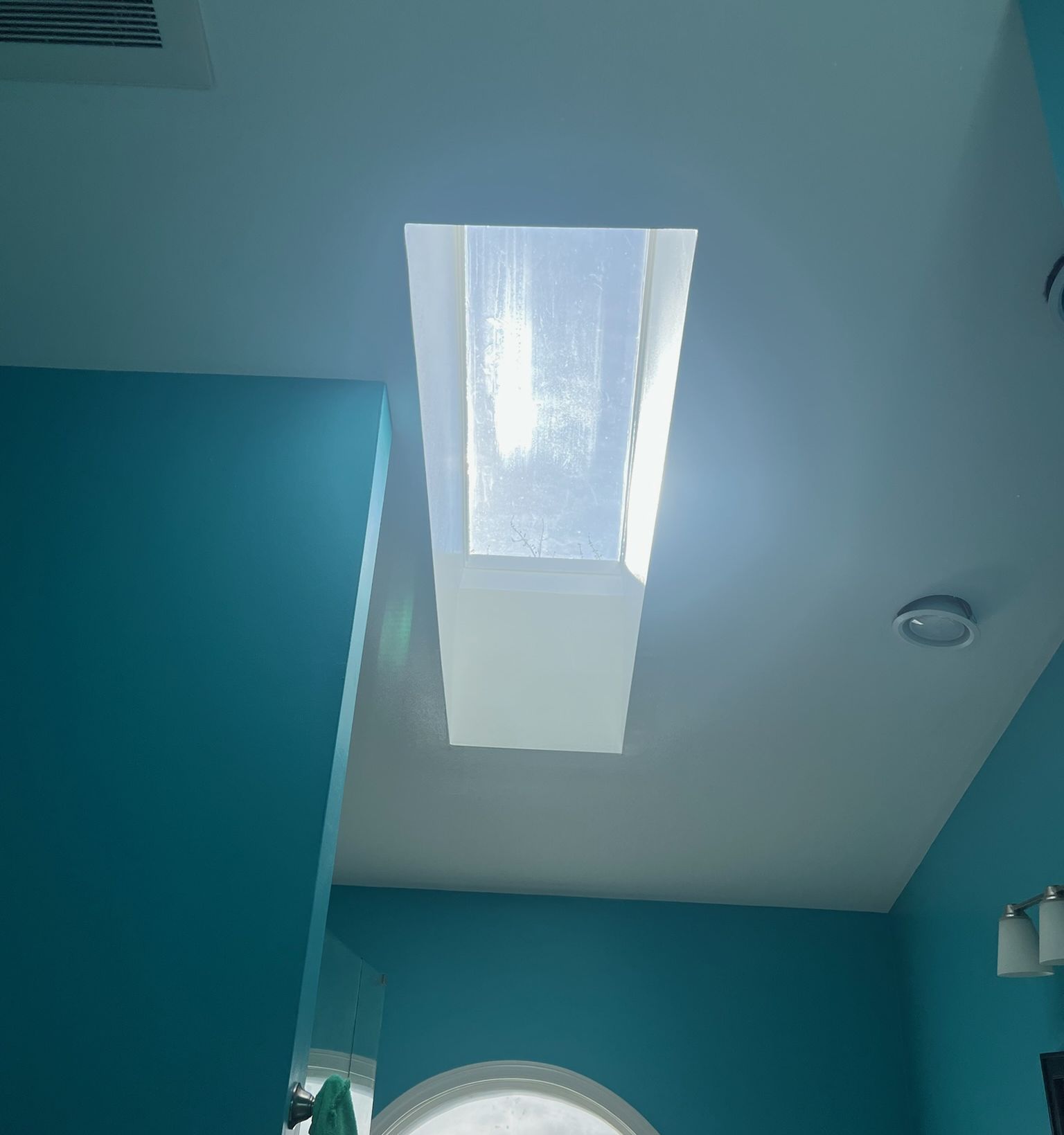 Skylight well patched, finished and painted